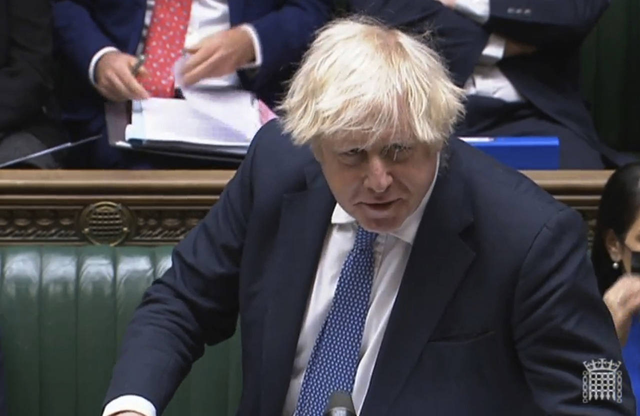 In this grab taken from video, Britain's Prime Minister Boris Johnson speaks during Prime Minister'...