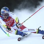
              Switzerland's Marco Odermatt speeds down the course during an alpine ski, men's World Cup giant slalom, in Alta Badia, Italy, Sunday, Dec.19, 2021. (AP Photo/Gabriele Facciotti)
            