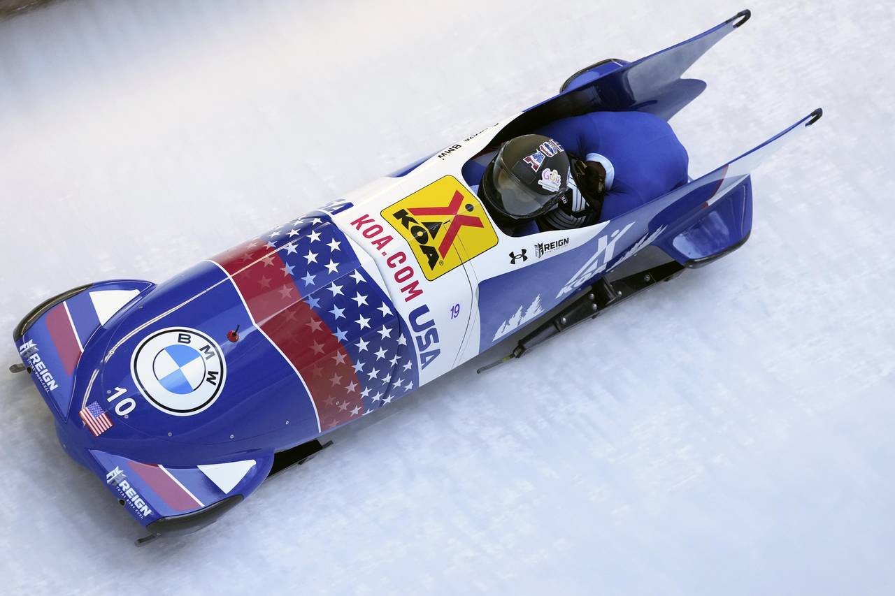 Elana Meyers Taylor and Aja Evans of the United States speed down the track during the women's two-...