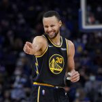 
              Golden State Warriors guard Stephen Curry celebrates during the second half of the team's NBA basketball game against the Portland Trail Blazers in San Francisco, Wednesday, Dec. 8, 2021. (AP Photo/Jeff Chiu)
            