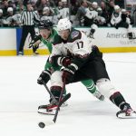 
              Dallas Stars defenseman John Klingberg (3) defends as Arizona Coyotes center Alex Galchenyuk (17) attempts to control the puck on an attack in the second period of an NHL hockey game in Dallas, Monday, Dec. 6, 2021. (AP Photo/Tony Gutierrez)
            