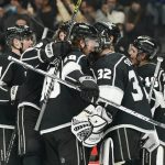
              Los Angeles Kings players celebrate the team's 2-1 shootout win against the Vancouver Canucks in an NHL hockey game Thursday, Dec. 30, 2021, in Los Angeles. (AP Photo/Jae C. Hong)
            