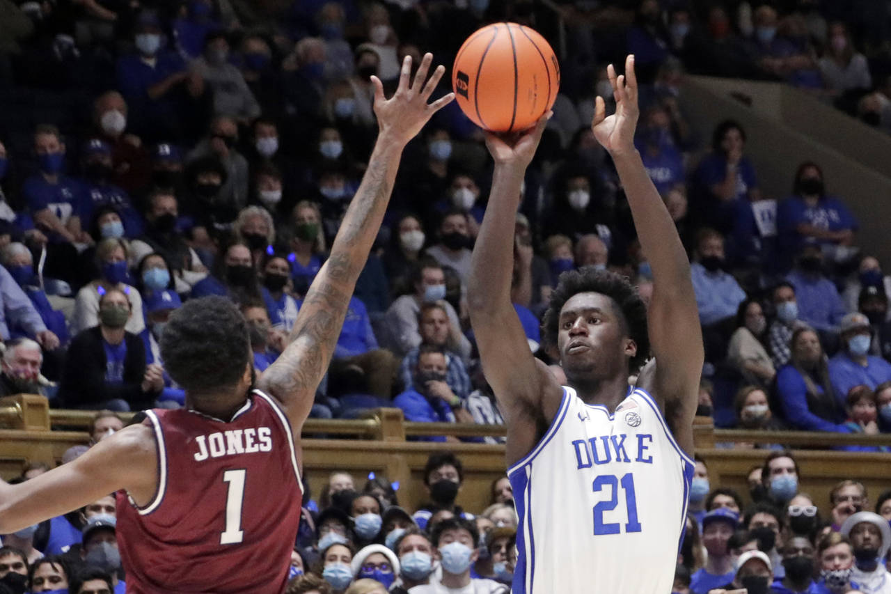 Duke forward A.J. Griffin (21) shoots over South Carolina State guard Cameron Jones (1) during the ...