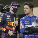 
              Red Bull driver Max Verstappen of the Netherlands talks to third places Mclaren driver Lando Norris of Britain after winning the pole position for the Formula One Abu Dhabi Grand Prix in Abu Dhabi, United Arab Emirates, Saturday, Dec. 11, 2021. (AP Photo/Kamran Jebreili, Pool)
            