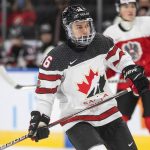
              Canada's Connor Bedard (16) skates against Austria during the third period of an IIHF junior world hockey championships game Tuesday, Dec. 28, 2021 in Edmonton, Alberta. (Jason Franson/The Canadian Press via AP)
            