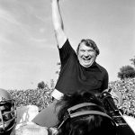 
              FILE - Coach John Madden of the Oakland Raiders is carried from the field by his players after his team defeated the Minnesota Vikings in Super Bowl XI in Pasadena, Calif., Jan. 9, 1977  John Madden, the Hall of Fame coach turned broadcaster whose exuberant calls combined with simple explanations provided a weekly soundtrack to NFL games for three decades, died Tuesday, Dec. 28, 2021, the NFL said. He was 85. (AP Photo/File)
            