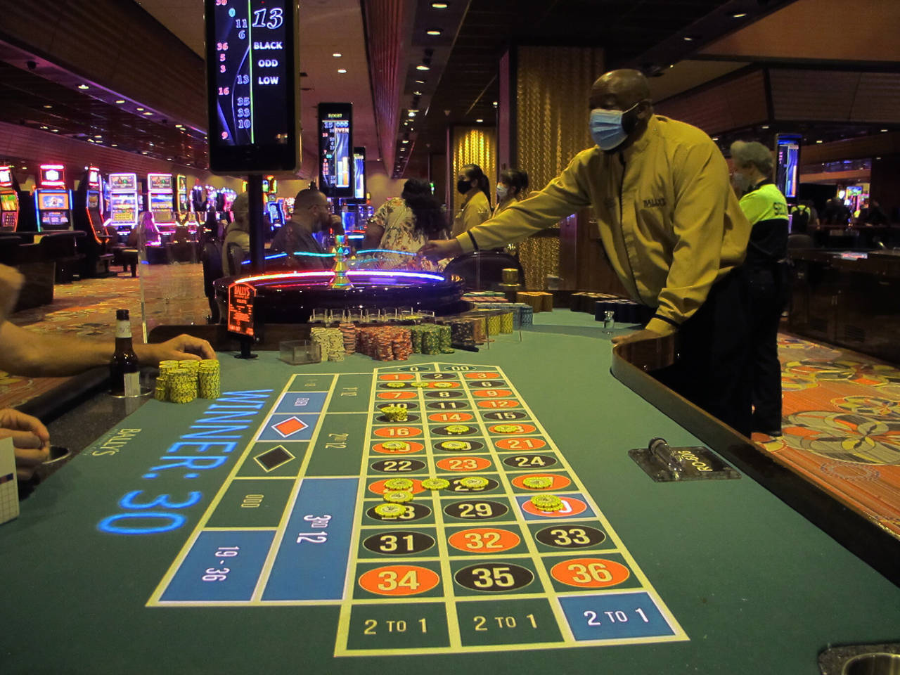 A dealer conducts a game of roulette in Bally's casino in Atlantic City, N.J. on June 23, 2021. On ...