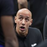 
              Sacramento Kings assistant coach Doug Christie instructs his players during a timeout against the Washington Wizards during the first quarter of an NBA basketball game in Sacramento, Calif., Wednesday, Dec. 15, 2021. Christie was filling in for the Kings head coach Alvin Gentry who recently tested positive for COVID-19. (AP Photo/Randall Benton)
            
