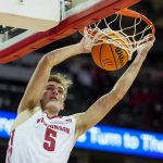 
              Wisconsin's Tyler Wahl (5) dunks against Illinois State during the second half of an NCAA college basketball game Wednesday, Dec. 29, 2021, in Madison, Wis. Wisconsin won 89-85. (AP Photo/Andy Manis)
            
