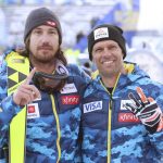 
              United States' Bryce Bennett, left, the winner, poses with United States' Steven Nyman after completing the course during an alpine ski, men's World Cup downhill race, in Val Gardena, Italy, Saturday, Dec.18, 2021. (AP Photo/Alessandro Trovati)
            