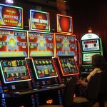 
              A gambler plays a slot machine in Bally's casino in Atlantic City, N.J. on June 23, 2021. On Thursday, Dec. 9, 2021, the American Gaming Association released statistics showing America's casinos have won more this year than ever before at $44.15 billion, and with more than a month still remaining in the year. (AP Photo/Wayne Parry)
            