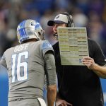 
              Detroit Lions head coach Dan Campbell gives quarterback Jared Goff the last play of the game during the second half of an NFL football game against the Minnesota Vikings, Sunday, Dec. 5, 2021, in Detroit. (AP Photo/Paul Sancya)
            