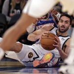 
              Denver Nuggets guard Facundo Campazzo looks to pass against the New York Knicks during the first half of an NBA basketball game Saturday, Dec. 4, 2021, in New York. (AP Photo/Adam Hunger)
            