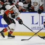 
              Anaheim Ducks left wing Sonny Milano (12) skates with the puck during the second period of an NHL hockey game against the Buffalo Sabres, Tuesday, Dec. 7, 2021, in Buffalo, N.Y. (AP Photo/Jeffrey T. Barnes)
            