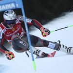 
              Norway's Henrik Kristoffersen speeds down the course during an alpine ski, men's World Cup giant slalom, in Alta Badia, Italy, Sunday, Dec.19, 2021. (AP Photo/Gabriele Facciotti)
            