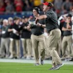 
              Georgia head coach Kirby Smart shouts during the first half of the Orange Bowl NCAA College Football Playoff semifinal game against Michigan, Friday, Dec. 31, 2021, in Miami Gardens, Fla. (AP Photo/Rebecca Blackwell)
            
