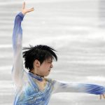 
              Yuzuru Hanyu of Japan performs during men's short program competition of Japan Figure Skating Championships at Saitama Super Arena, in Saitama, north of Tokyo, Friday, Dec. 24, 2021. (AP Photo/Eugene Hoshiko)
            