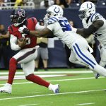 
              Houston Texans quarterback Tyrod Taylor (5) is sacked by Indianapolis Colts defensive end Al-Quadin Muhammad (97) during the first half of an NFL football game, Sunday, Dec. 5, 2021, in Houston. (AP Photo/Justin Rex )
            
