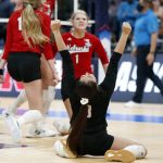 
              Nebraska's Lexi Rodriguez, center, celebrates an NCAA women's college volleyball tournament victory over Pittsburgh Friday, Dec. 17, 2021, in Columbus, Ohio. (AP Photo/Paul Vernon)
            