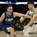 
              Charlotte Hornets' Gordon Hayward tries to get past Milwaukee Bucks' Grayson Allen during the first half of an NBA basketball game Wednesday, Dec. 1, 2021, in Milwaukee. (AP Photo/Morry Gash)
            