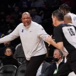 
              Philadelphia 76ers head coach Doc Rivers, left, argues a call by referee Pat Fraher (26) during the first half of an NBA basketball game against the Brooklyn Nets, Thursday, Dec. 16, 2021, in New York. (AP Photo/Mary Altaffer)
            