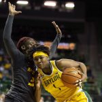 
              Baylor forward NaLyssa Smith (1) drives to the basket as Missouri guard Aijha Blackwell (33) defends in the first half of an NCAA college basketball game in Waco, Texas, Saturday, Dec. 4, 2021. (AP Photo/Emil Lippe)
            