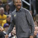 
              Wichita State coach Isaac Brown yells instructions to his team during the first half of an NCAA college basketball game against Kansas State, Sunday, Dec. 5, 2021, in Wichita, Kan. (Travis Heying/The Wichita Eagle via AP)
            