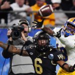 
              Wake Forest defensive back Ja'Sir Taylor breaks up a pass intended for Pittsburgh wide receiver Shocky Jacques-Louis during the first half of the Atlantic Coast Conference championship NCAA college football game Saturday, Dec. 4, 2021, in Charlotte, N.C. (AP Photo/Jacob Kupferman)
            