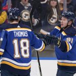 
              St. Louis Blues' Vladimir Tarasenko (91) is congratulated by Robert Thomas (18) after scoring during the second period of an NHL hockey game against the Edmonton Oilers Wednesday, Dec. 29, 2021, in St. Louis. (AP Photo/Jeff Roberson)
            