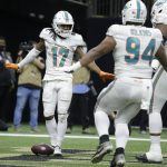 
              Miami Dolphins' Jaylen Waddle (17) celebrates with teammates after scoring a touchdown against the New Orleans Saints during the second half of an NFL football game Monday, Dec. 27, 2021, in New Orleans. (AP Photo/Butch Dill)
            