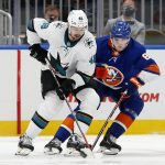 
              San Jose Sharks center Tomas Hertl (48) vies for the puck against New York Islanders defenseman Noah Dobson (8) during the second period of an NHL hockey game on Thursday, Dec. 2, 2021, in Elmont, N.Y. (AP Photo/Jim McIsaac)
            