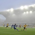
              Fog envelopes the field during the English Premier League soccer match between Wolverhampton Wanderers and Chelsea at Molineux stadium in Wolverhampton, England, Sunday, Dec. 19, 2021. (AP Photo/Rui Vieira)
            