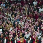 
              Alabama fans cheer during the second half of the Southeastern Conference championship NCAA college football game against Georgia, Saturday, Dec. 4, 2021, in Atlanta. (AP Photo/Brynn Anderson)
            