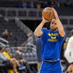 
              Golden State Warriors guard Stephen Curry (30) warms up on the court before an NBA basketball game against the Indiana Pacers in Indianapolis, Monday, Dec. 13, 2021. Curry is seven three-point baskets away from an NBA record. (AP Photo/Doug McSchooler)
            