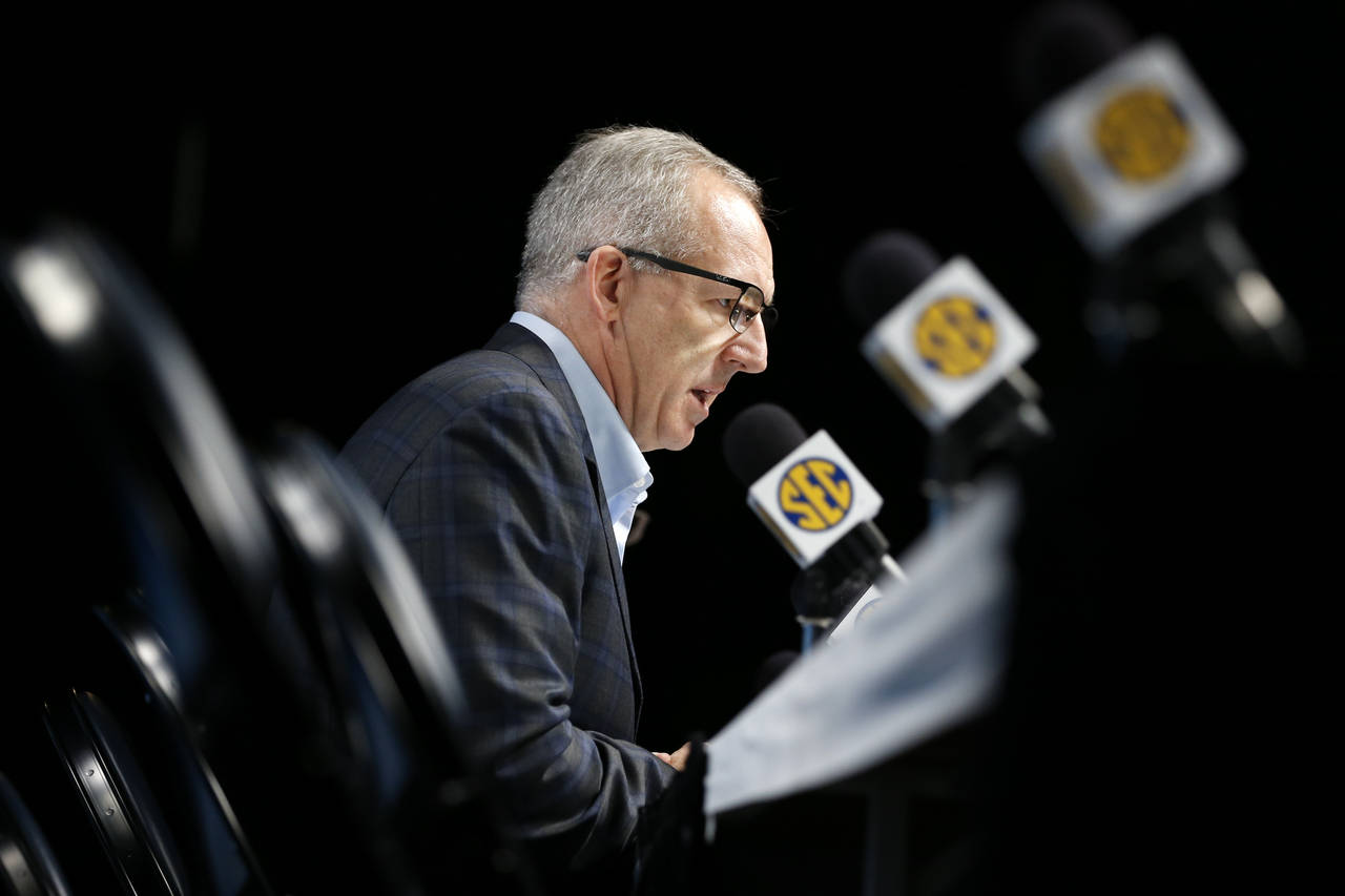 FILE - Greg Sankey, commissioner of the Southeastern Conference speaks during a news conference on ...
