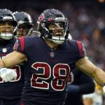 
              Houston Texans running back Rex Burkhead (28) celebrates after running for a touchdown against the Los Angeles Chargers during the second half of an NFL football game Sunday, Dec. 26, 2021, in Houston. (AP Photo/Eric Christian Smith)
            