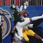 
              Pittsburgh defensive back Damarri Mathis (21) breaks up a pass intended for Michigan State wide receiver Jalen Nailor during the second half of the Peach Bowl NCAA college football game, Thursday, Dec. 30, 2021, in Atlanta. (AP Photo/John Bazemore)
            
