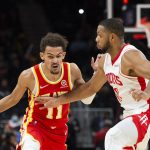 
              Houston Rockets guard Eric Gordon (10) defends against Atlanta Hawks guard Trae Young (11) during the first half of an NBA basketball game against the Monday, Dec. 13, 2021, in Atlanta. (AP Photo/Hakim Wright Sr.)
            