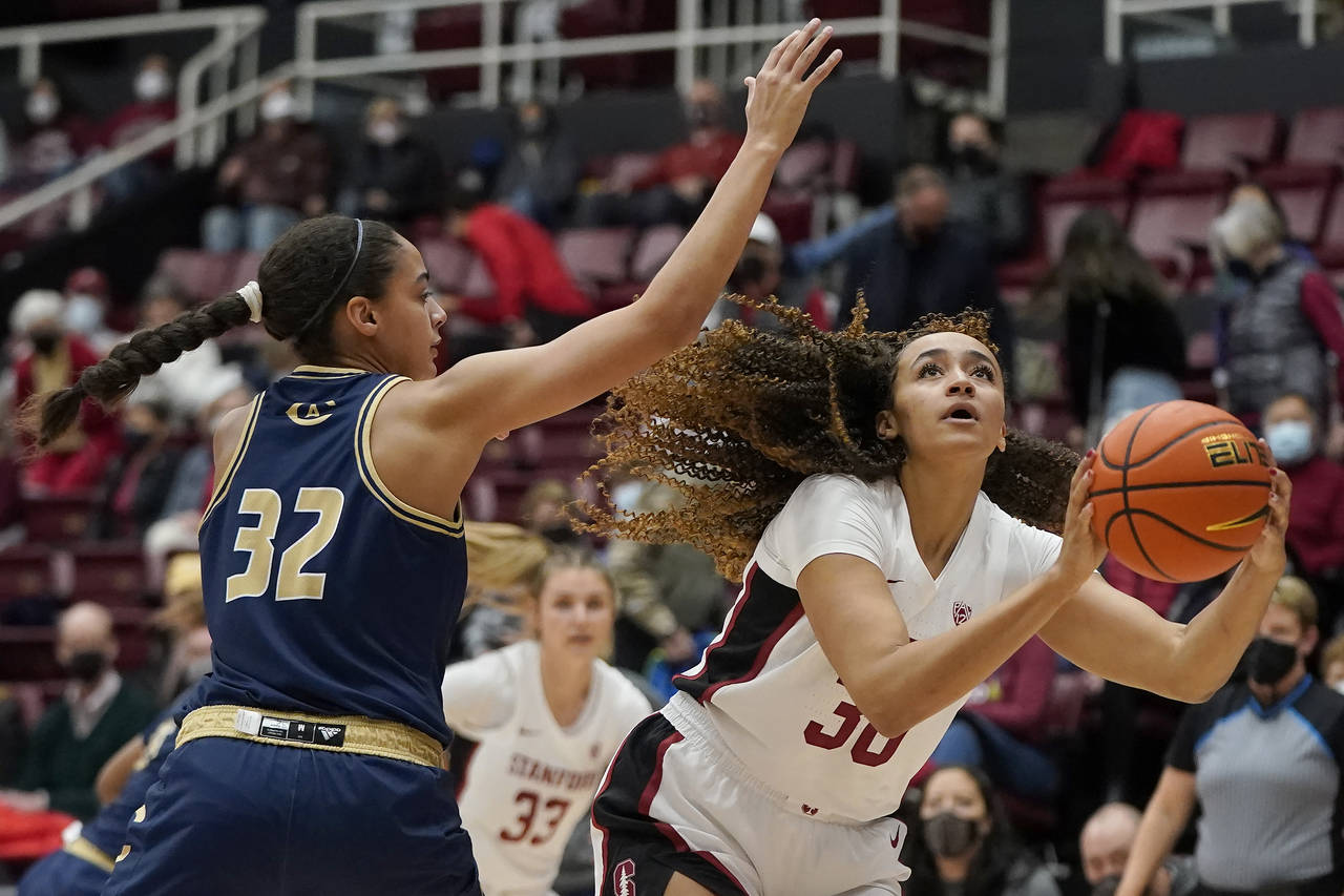 Stanford guard Haley Jones, right, shoots against UC Davis forward Cierra Hall (32) during the firs...