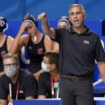 
              FILE - United States head coach Adam Krikorian, right, directs players during a quarterfinal round win over Canada in a women's water polo match at the 2020 Summer Olympics, Aug. 3, 2021, in Tokyo, Japan. Right after the Summer Olympics, Krikorian was done. Worn down by coaching the U.S. women's water polo team through a pandemic, he thought it might be time to try something new. (AP Photo/Mark Humphrey, File)
            