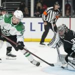 
              Los Angeles Kings goaltender Jonathan Quick (32) blocks a shot by Dallas Stars center Jacob Peterson (40) during the third period of an NHL hockey game Thursday, Dec. 9, 2021, in Los Angeles. (AP Photo/Ashley Landis)
            