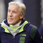 
              FILE - Seattle Seahawks head coach Pete Carroll walks on the field before an NFL football game against the San Francisco 49ers, Dec. 5, 2021, in Seattle. The NFL is requiring players, coaches and other team personnel to receive a COVID-19 booster by Dec. 27. In a memo sent to teams on Monday, Dec. 13, 2021, and obtained by The Associated Press, the league said: “Given the increased prevalence of the virus in our communities, our experts have recommended that we implement the CDC’s recommendation.” (AP Photo/Elaine Thompson, File)
            