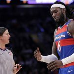 
              Washington Wizards center Montrezl Harrell questions a call by referee Natalie Sago during the second half of the tema's NBA basketball game against the New York Knicks on Thursday, Dec. 23, 2021, in New York. The Wizards won 124-117. (AP Photo/Adam Hunger)
            