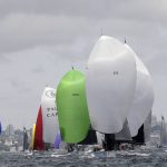 
              Yachts use their spinnakers at the start of the 76th annual Sydney Hobart yacht race in Sydney, Sunday, Dec. 26, 2021. Last year's race was canceled the week before it was due to start because of coronavirus-related quarantine issues, but the 2021 edition is proceeding with mass virus-testing protocols in place. (Dan Himbrechts/AAP Image via AP)
            
