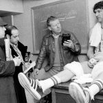 
              FILE - Boston Celtics' John Havlicek chats with newsmen after an NBA workout in Lexington, Mass., March 17, 1976. (AP Photo/ File)
            