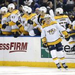 
              Nashville Predators center Philip Tomasino (26) reacts after scoring a goal against the New York Rangers during the second period of an NHL hockey game, Sunday, Dec. 12, 2021, in New York. (AP Photo/Noah K. Murray)
            