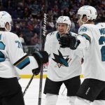
              San Jose Sharks center Nick Bonino (13) celebrates his goal against the New York Islanders with teammates Jonathan Dahlen (76) and Timo Meier (28) during the first period of an NHL hockey game on Thursday, Dec. 2, 2021, in Elmont, N.Y. (AP Photo/Jim McIsaac)
            
