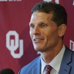 
              Oklahoma head football coach Brent Venables answers a question at an NCAA college football news conference, Monday, Dec. 6, 2021, in Norman, Okla. (AP Photo/Sue Ogrocki)
            