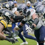 
              Tennessee Titans linebacker Derick Roberson (50) leads the blocking as his line attacks the Pittsburgh Steelers during the first half of an NFL football game, Sunday, Dec. 19, 2021, in Pittsburgh. (AP Photo/Gene J. Puskar)
            