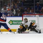 
              Vegas Golden Knights' Robin Lehner, right, makes a save against New York Islanders' Oliver Wahlstrom (26) during the shootout of an NHL hockey game Sunday, Dec. 19, 2021, in Elmont, N.Y. (AP Photo/John Munson)
            